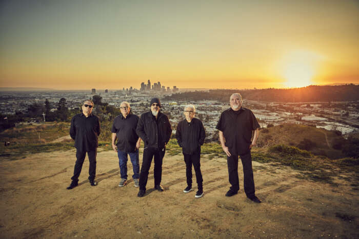 Los Lobos Bandfoto am Strand, Sonnenuntergang