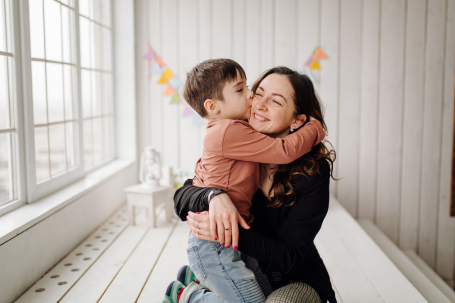 mother-her-son-are-posing-studio-wearing-casual-clothes